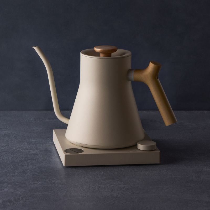 Fellow Stagg EKG PRO 900ml electric kettle in sesame beige with a wooden handle